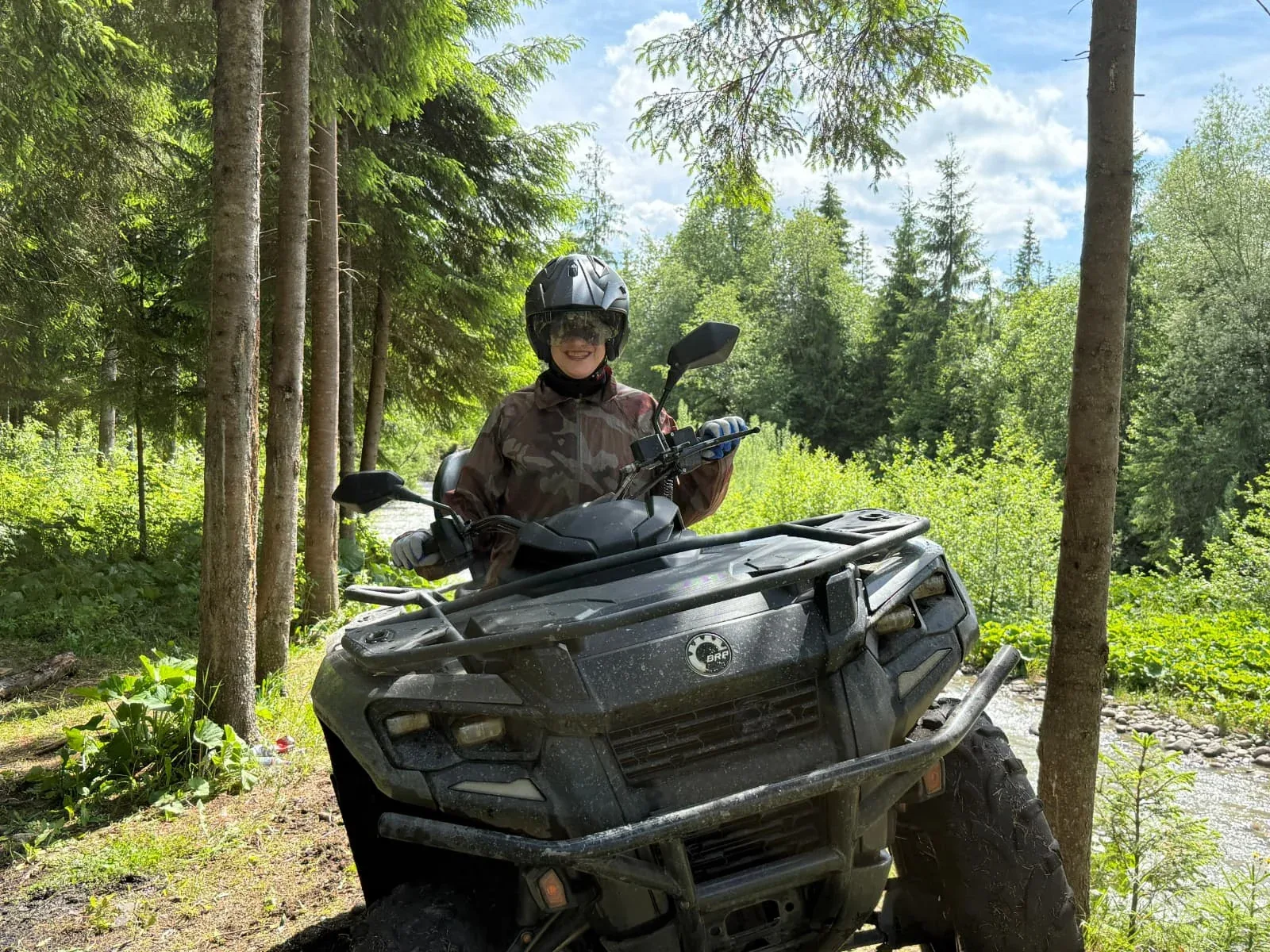 Guest on a quad bike on a forest trail in the Tatra region