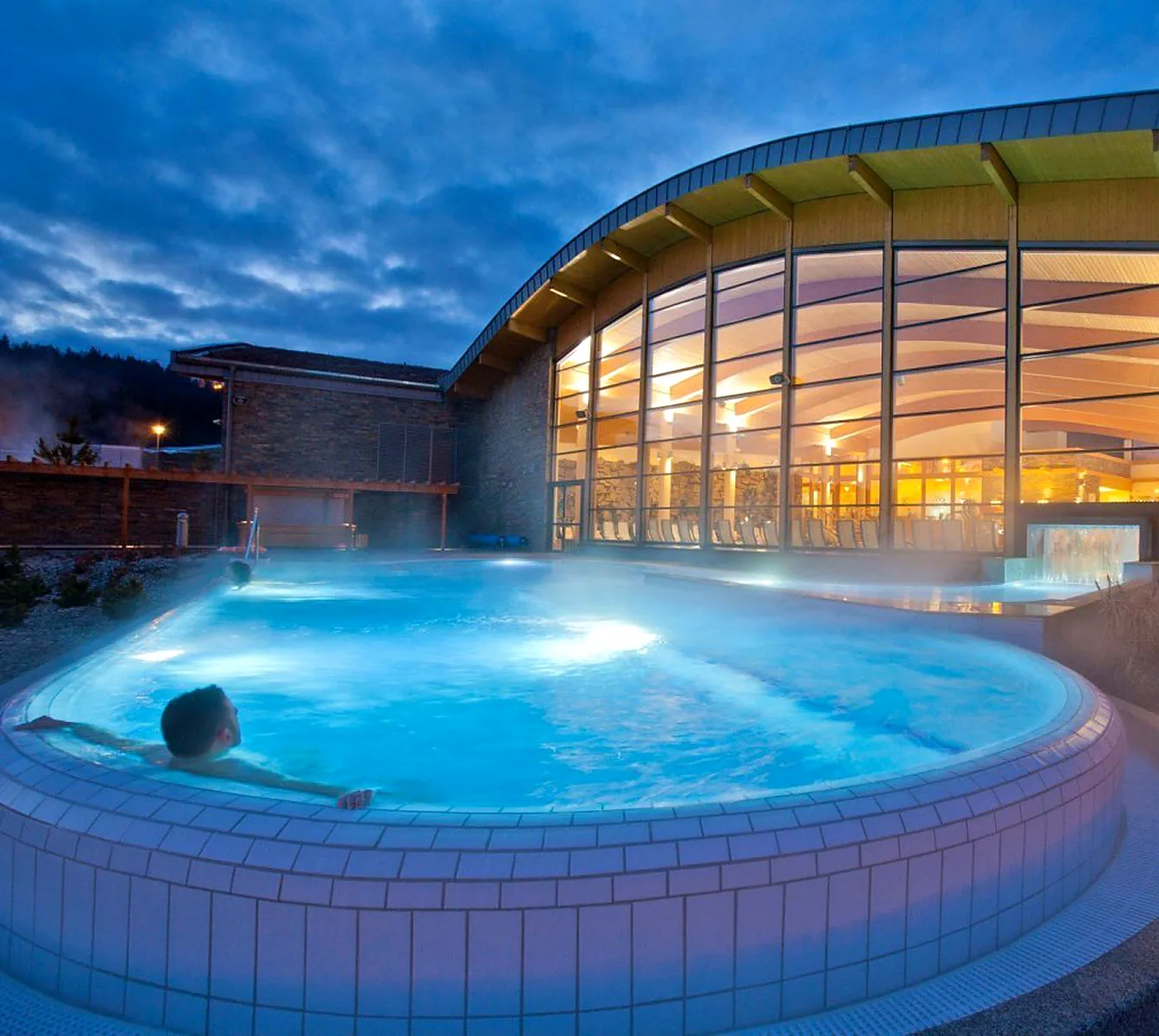 Warm outdoor thermal pool in the Tatra region during winter